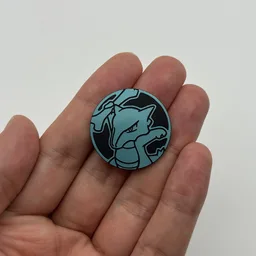 In hand, from Pokémon Coin Fan, full size