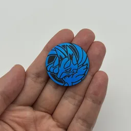 In hand, from Pokémon Coin Fan, full size