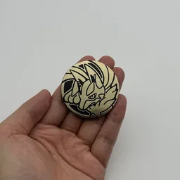 In hand, from Pokémon Coin Fan, full size