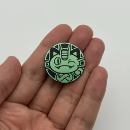 In hand, from Pokémon Coin Fan, full size