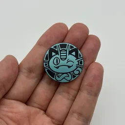 In hand, from Pokémon Coin Fan, full size