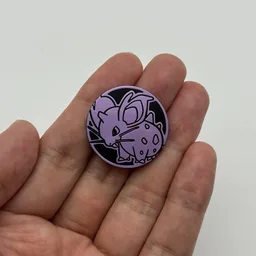 In hand, from Pokémon Coin Fan, full size