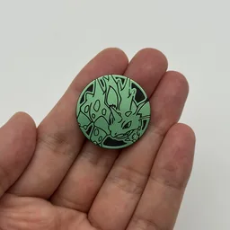 In hand, from Pokémon Coin Fan, full size