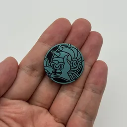 In hand, from Pokémon Coin Fan, full size