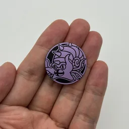 In hand, from Pokémon Coin Fan, full size