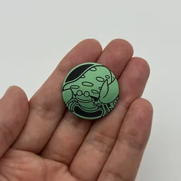 In hand, from Pokémon Coin Fan, full size