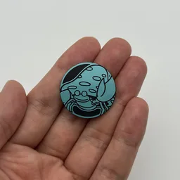 In hand, from Pokémon Coin Fan, full size