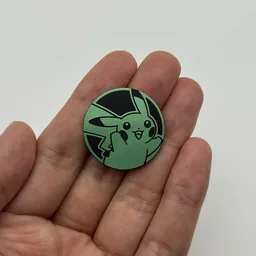 In hand, from Pokémon Coin Fan, full size