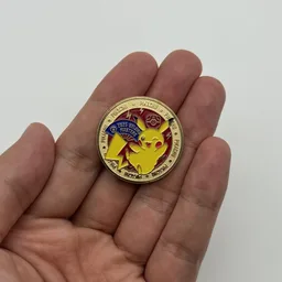 In hand, from Pokémon Coin Fan, full size