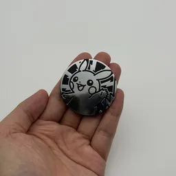 In hand, from Pokémon Coin Fan, full size