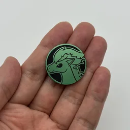 In hand, from Pokémon Coin Fan, full size