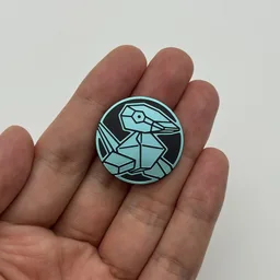 In hand, from Pokémon Coin Fan, full size