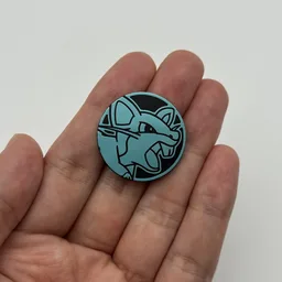 In hand, from Pokémon Coin Fan, full size