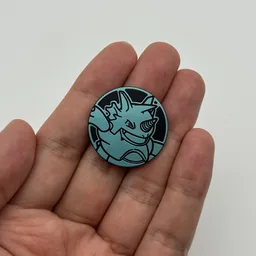 In hand, from Pokémon Coin Fan, full size