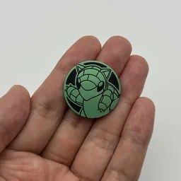 In hand, from Pokémon Coin Fan, full size