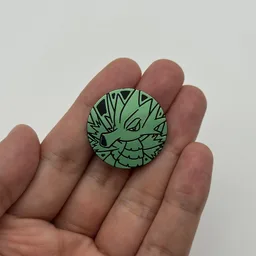 In hand, from Pokémon Coin Fan, full size