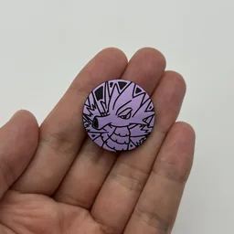 In hand, from Pokémon Coin Fan, full size