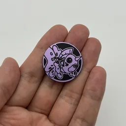 In hand, from Pokémon Coin Fan, full size