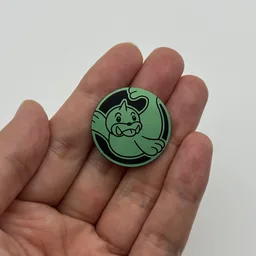 In hand, from Pokémon Coin Fan, full size
