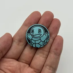 In hand, from Pokémon Coin Fan, full size
