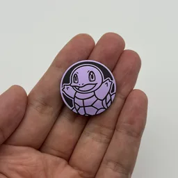In hand, from Pokémon Coin Fan, full size