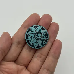 In hand, from Pokémon Coin Fan, full size