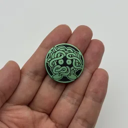 In hand, from Pokémon Coin Fan, full size