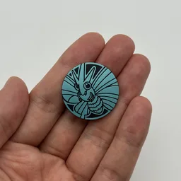 In hand, from Pokémon Coin Fan, full size