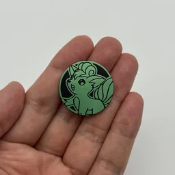 In hand, from Pokémon Coin Fan, full size