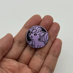 In hand, from Pokémon Coin Fan, full size