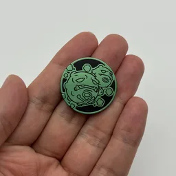 In hand, from Pokémon Coin Fan, full size