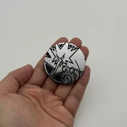 In hand, from Pokémon Coin Fan, full size