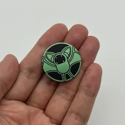 In hand, from Pokémon Coin Fan, full size