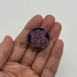 In hand, from Pokémon Coin Fan, full size