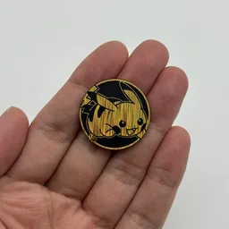 In hand, from Pokémon Coin Fan, full size