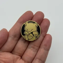In hand, from Pokémon Coin Fan, full size