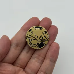 In hand, from Pokémon Coin Fan, full size