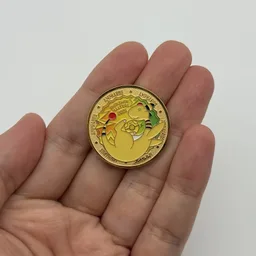 In hand, from Pokémon Coin Fan, full size