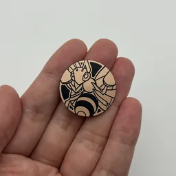 In hand, from Pokémon Coin Fan, full size