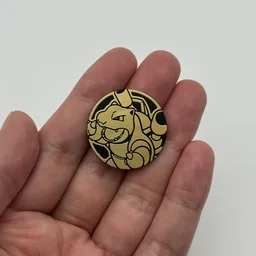 In hand, from Pokémon Coin Fan, full size