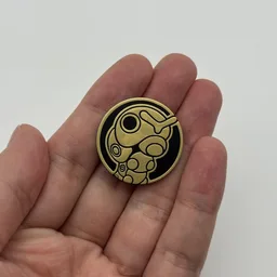 In hand, from Pokémon Coin Fan, full size