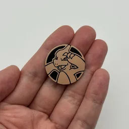 In hand, from Pokémon Coin Fan, full size