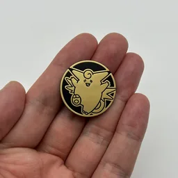 In hand, from Pokémon Coin Fan, full size