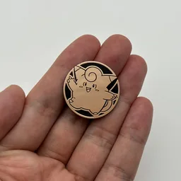 In hand, from Pokémon Coin Fan, full size