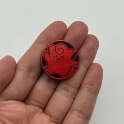 In hand, from Pokémon Coin Fan, full size