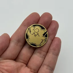 In hand, from Pokémon Coin Fan, full size