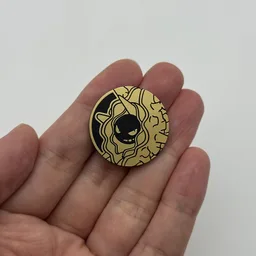 In hand, from Pokémon Coin Fan, full size