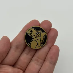 In hand, from Pokémon Coin Fan, full size
