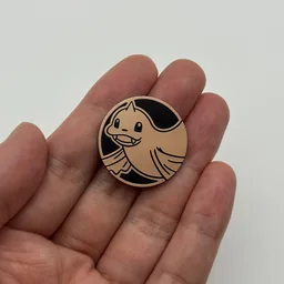 In hand, from Pokémon Coin Fan, full size