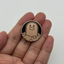 In hand, from Pokémon Coin Fan, full size